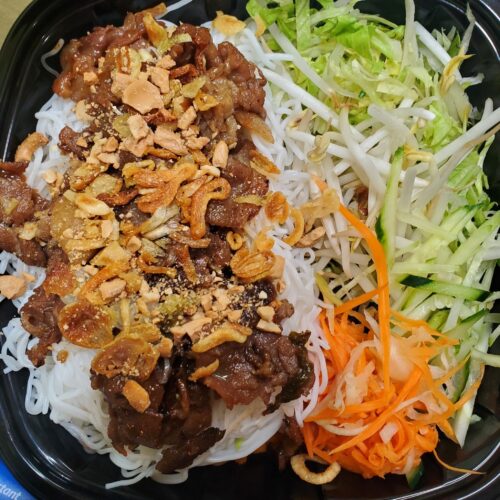 pork vermicelli with shredded carrots, cucumbers and bean sprouts